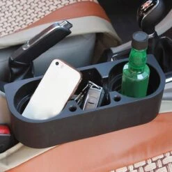 Merkloos Decopatent® Autostoel Organizer - Voor Tussen Auto Stoel / Console - Bekerhouder & Telefoonhouder - Opbergvakken - Auto Organiser -Kinderwagen- En Accessoirewinkel 1200x1200 411